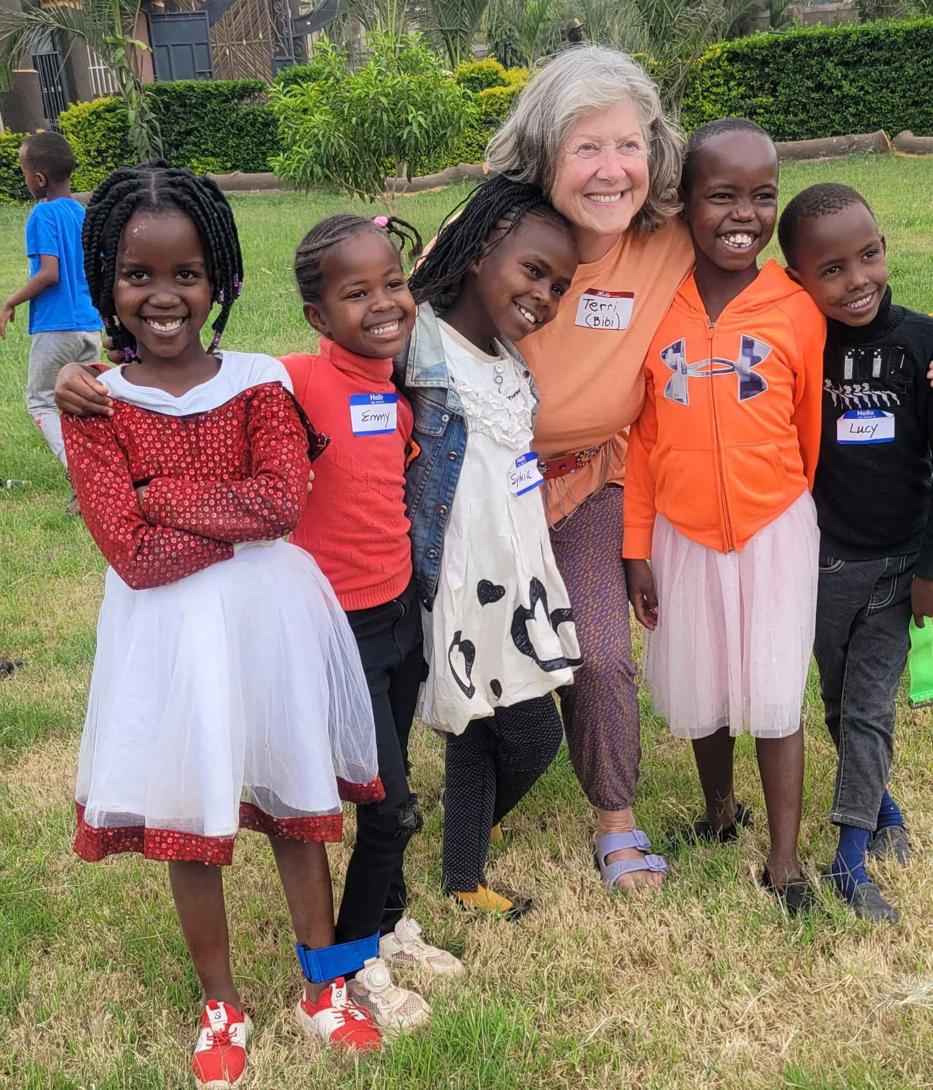 A supporter with five children from the Amboseli programme